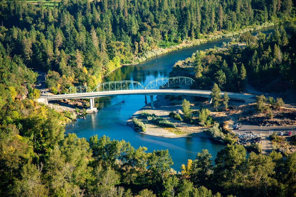 RV owner checking and maintaining equipment